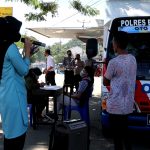 Tingkatkan Pelayanan, Oto Heheliliya (Mobil Keliling) Polres Bone Bolango Berikan Pelayanan Terpadu Di Pasar Tradisional