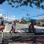 Humanis, Gatur Pagi Samapta Polda Gorontalo Bantu Anak Sekolah Menyeberang Jalan